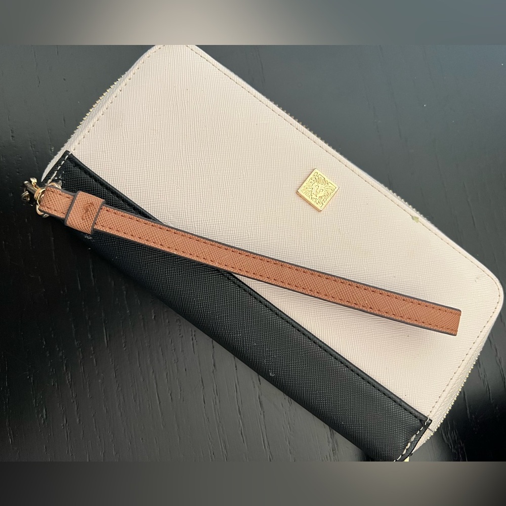 Elegant Black and Cream Wallet with Gold Accent